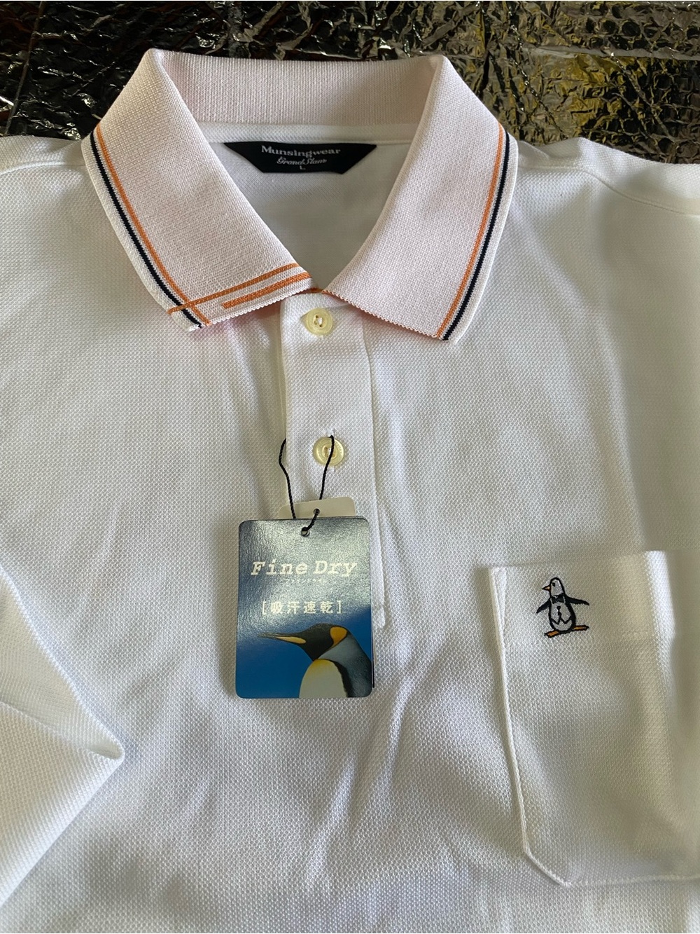 Munsingwear White Polo with Orange and Black Trim Collar